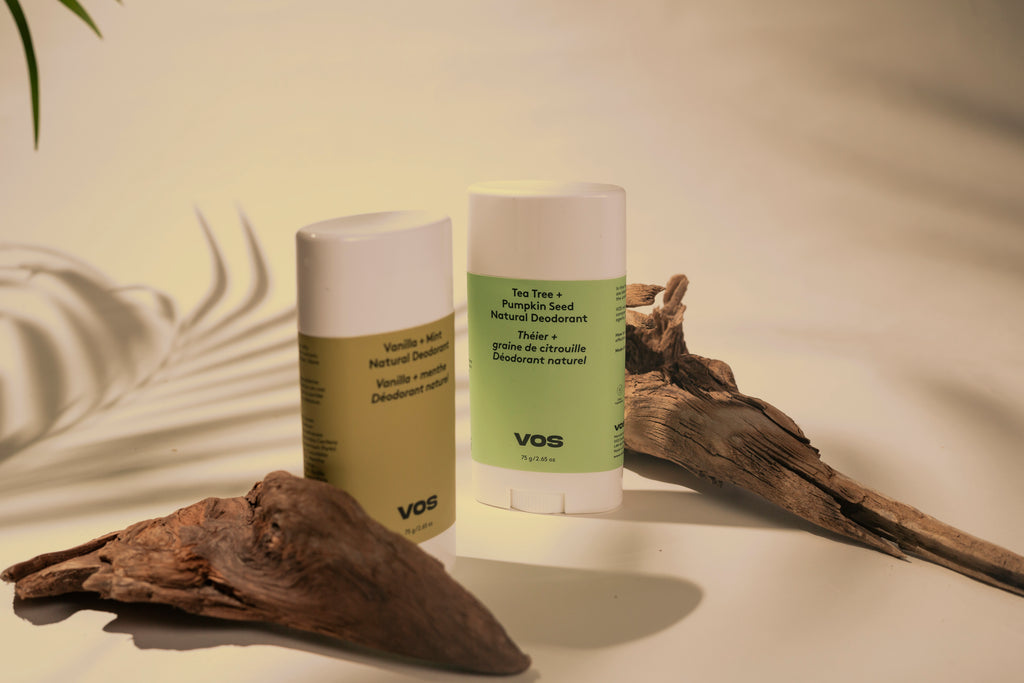 Elegant product display showcasing natural deodorants in a calming, earthy setting.